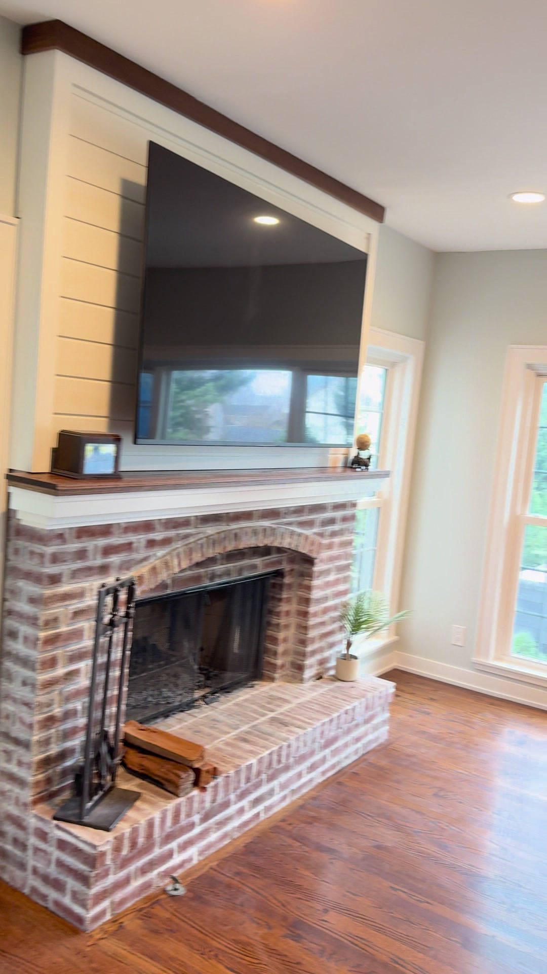 Geneva whole-home repaint · Benjamin Moore, From our project video · Fireplace and surrounding wall details