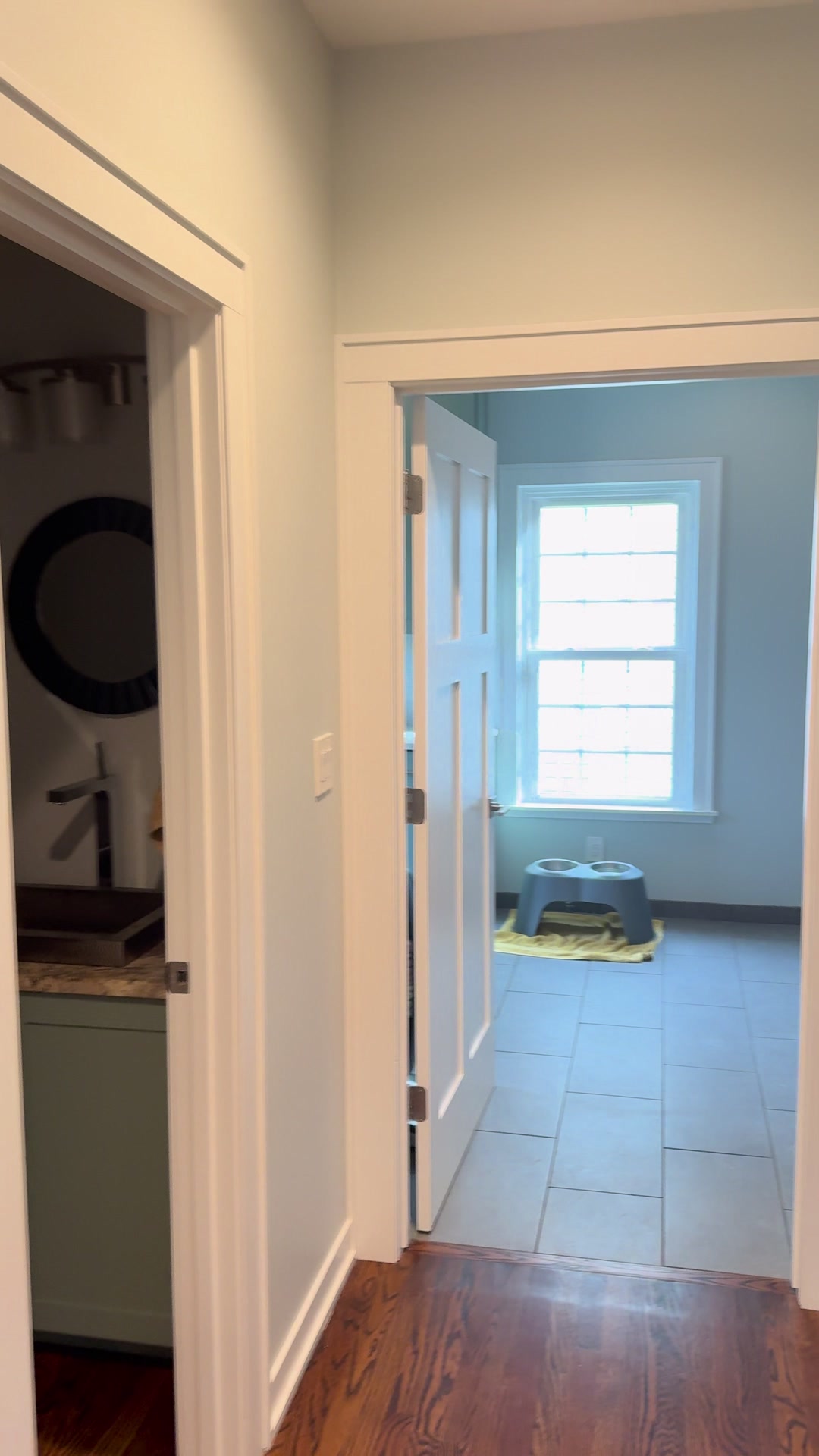 Geneva whole-home repaint · Benjamin Moore, From our project video · Finished kitchen hallway and white trim