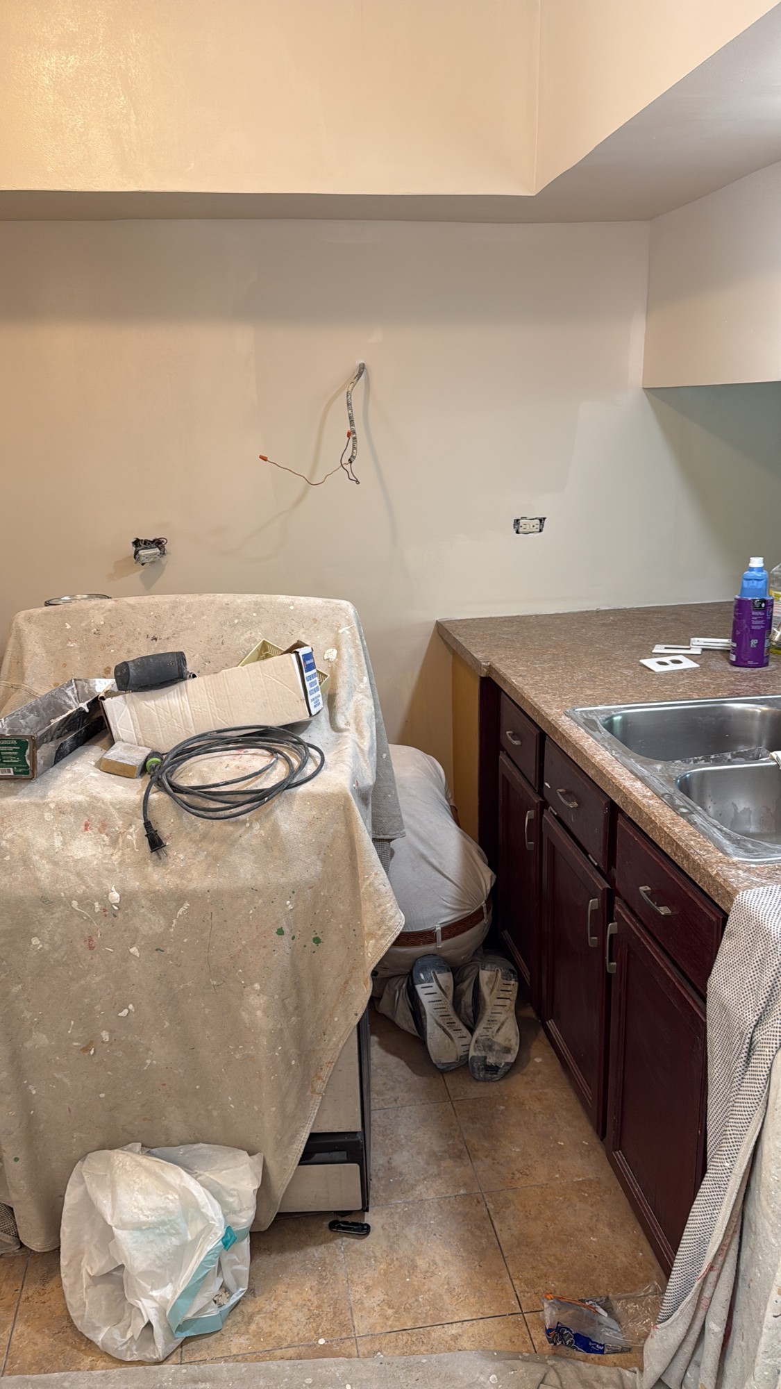 Kitchen Interior Restoration, In progress · Repaired kitchen wall before completion