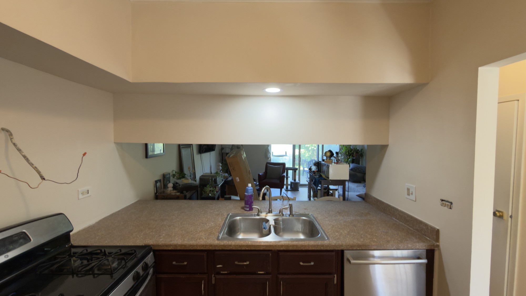 Kitchen Interior Restoration, Paint finish · View through the kitchen opening