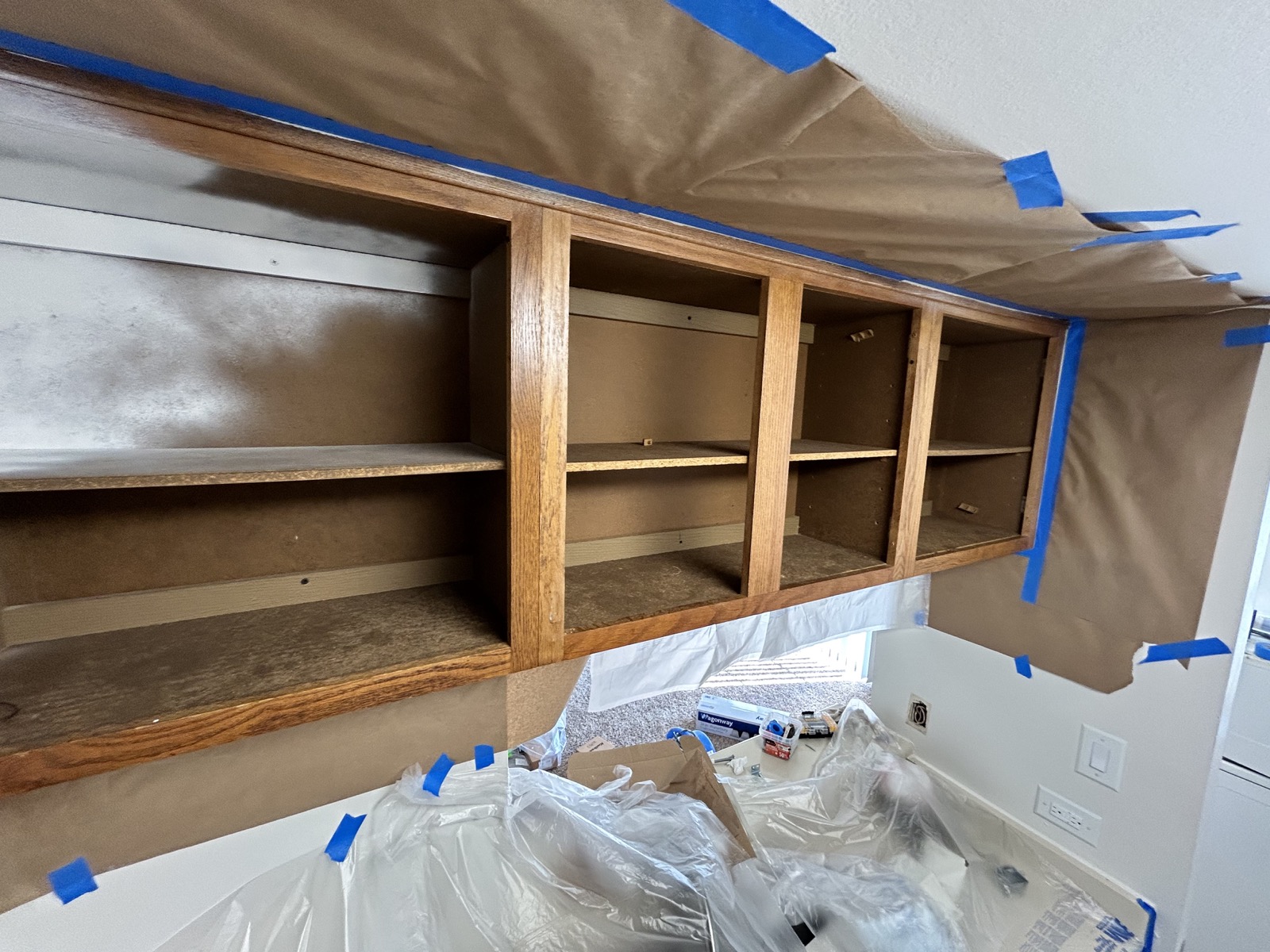 Monroe apartment cabinets · Pure White, Before painting · Upper wood cabinets