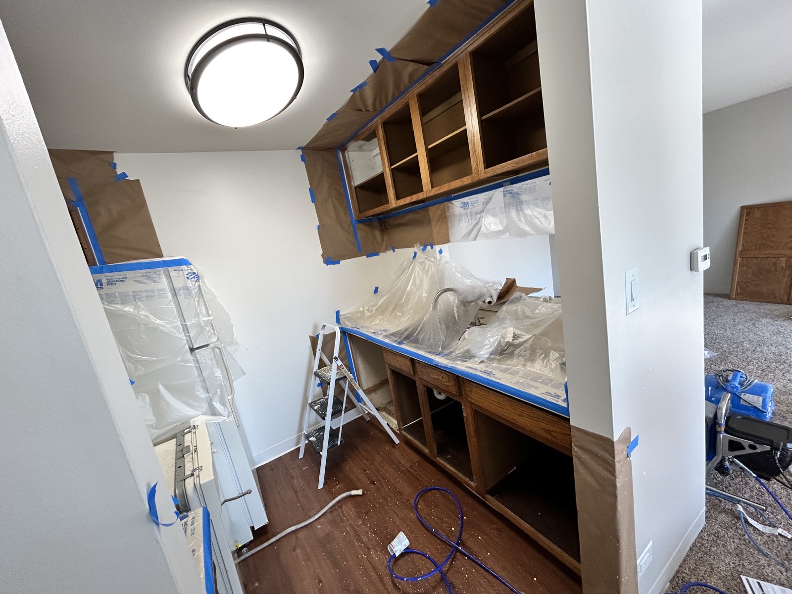 Monroe apartment cabinets · Pure White, Before painting · Protected kitchen